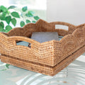 Scalloped Rattan Storage Basket with books