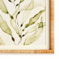Framed artwork with green leaf design on a white background