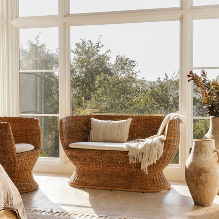 Siena Woven Rattan Settee and Chair styled in window