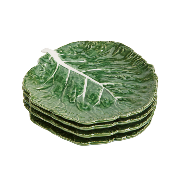 Stack of four green Cabbage Plates