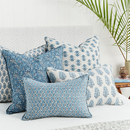 Orvietto Azure Lumbar Pillow Cover and Sundara Azure Pillow Cover styled on bed