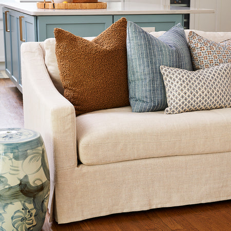 Twisted Flower Garden Stool styled next to sofa