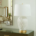 Tobacco Leaf Blanc de Chine Table lamp styled on green dresser