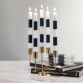 Navy Stripe Taper Candles in gold candle holder