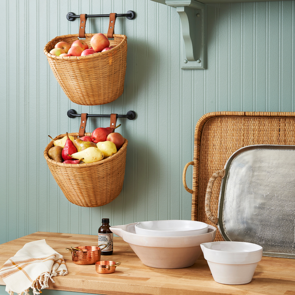 Wall Hanging Storage Basket filled with fruit styled in cottage kitchen