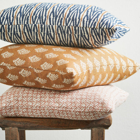 Walter G Sunbrella Rattan colorway outdoor pillow stack