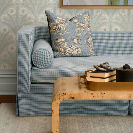 Waterfall Burlwood Coffee Table styled with blue sofa