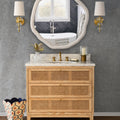 Watson Cerused Oak Cane Front Vanity styled in blue bathroom with white round mirror