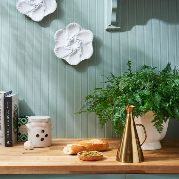 Poloma Oil Cruet and White Oyster Plates Styled On Wall - Dear Keaton