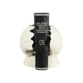 White Shell Cast Iron Bookends styled with black book