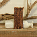 White Whale Cast Iron Bookends styled with antique books