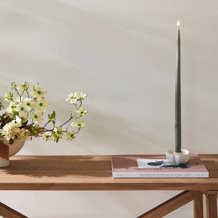 Ceramic Fleur Taper Holder Styled with lit candle