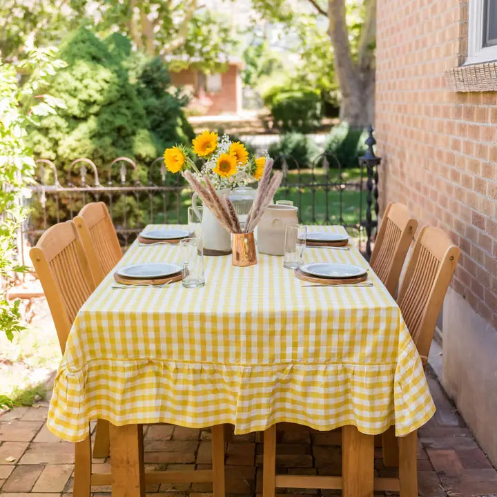 Yellow Ruffle Gingham Table Cloth on outdoor table