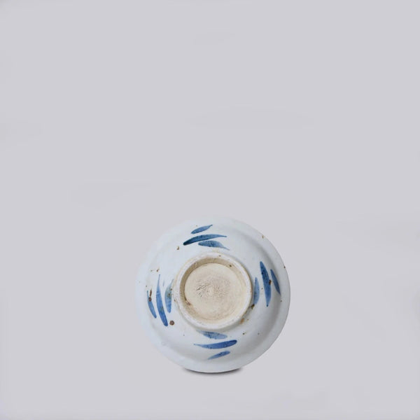 Blue and White Flower Trinket Dish underneath brushstrokes