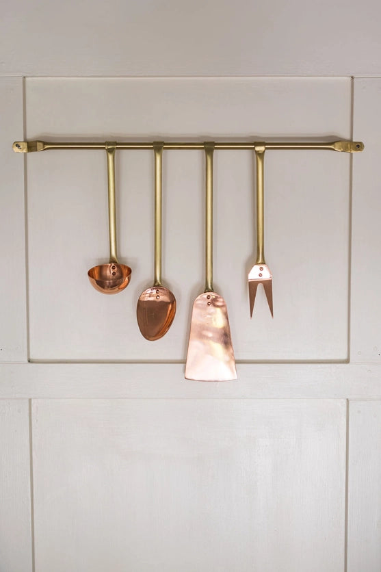 Copper Utensils on Brass Rod hanging 
