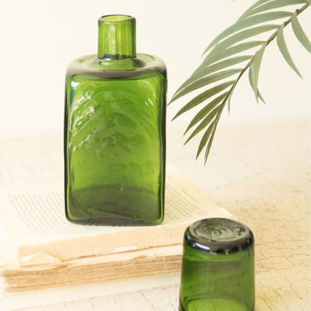 green glass carafe and water glass