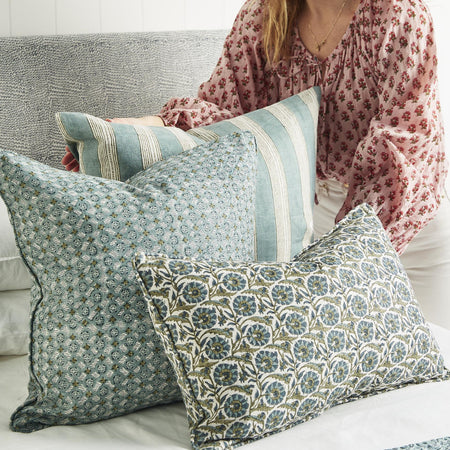 Istanbul Slate Pillow styled on bed