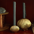 Brass Scallop Shell Candle Holders on shelf