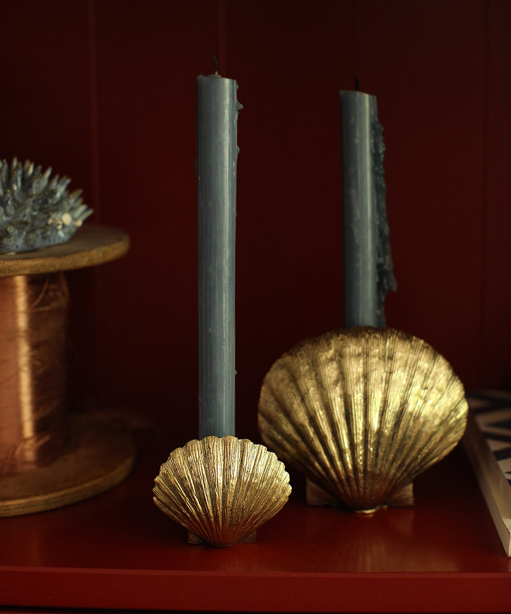 Brass Scallop Shell Candle Holders on shelf