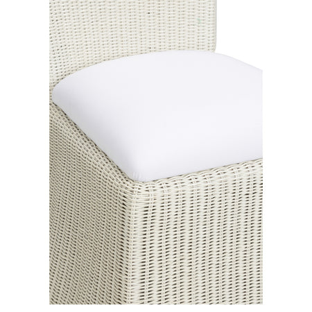 Whitewash Draped Wicker Chair with white cushion closeup