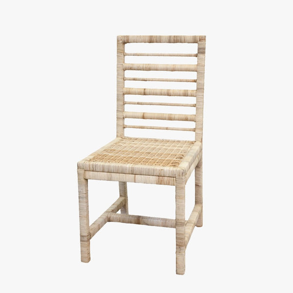 Light brown rattan dining chair with horizontal backrest slats